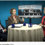 Two woman and a man talking over AirBnb Rentals